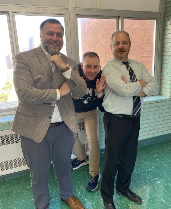 ATTACHED AT THE HIP: Dr. Otton and Dr. Sime. English chairperson Dr. Otton and math teacher Dr. Sime are regularly seen chatting throughout school, and Dr. Kowalczyk (center) always finds a way to interject.